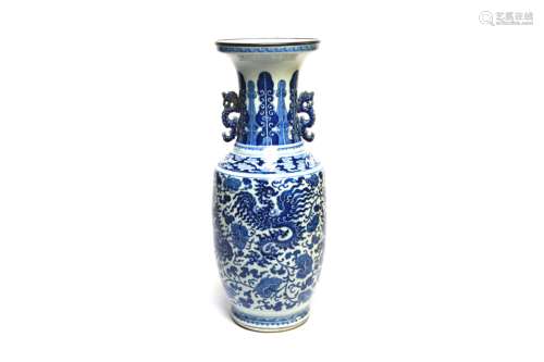 A blue and white porcelain vase painted with archaistic drag...