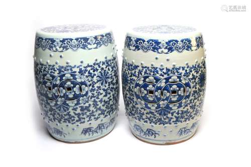 A pair of blue and white porcelain drum-shaped garden seats,...