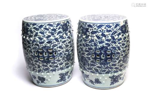 A pair of blue and white porcelain drum-shaped garden seats,...