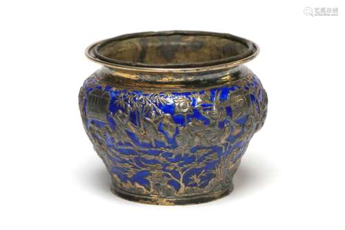 A carved and repousse' gilded silver enameled spittoon ...