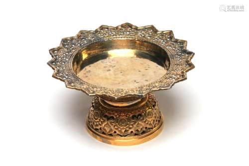 A carved and repousse' silver gilt stem tray decorated ...