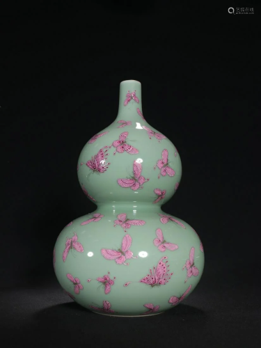 A Rare Bean Green Glazed Vase With Butterfly Pattern