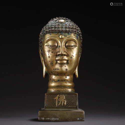 A Fine Gilt-bronze Figure of Buddha Head Seal