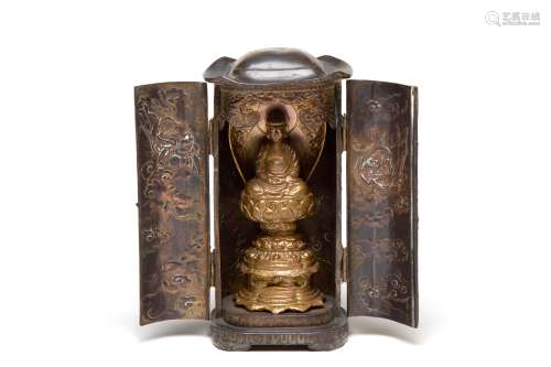 A brass Buddha seated on lotus pond in wood elaborate arch w...