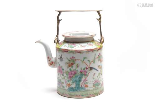 A Cantonese teapot painted with birds and butterflies in fli...