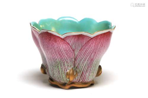 A polychrome porcelain teacup in the form of lotus pond