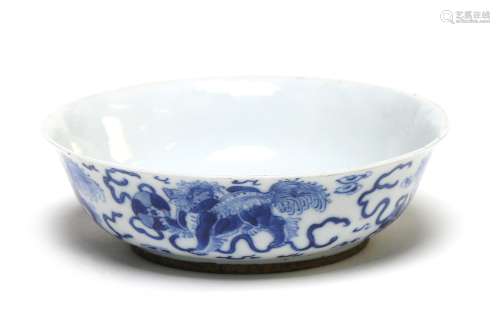 A blue and white porcelain tea bowl painted with Buddhist li...