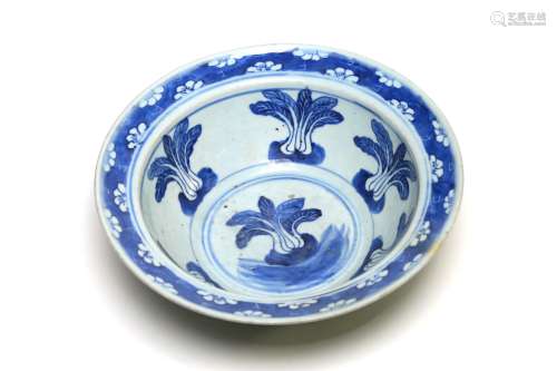 A blue and white porcelain basin painted with Chinese cabbag...