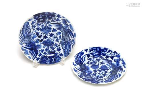 A pair of blue and white porcelain dishes with flower-shaped...