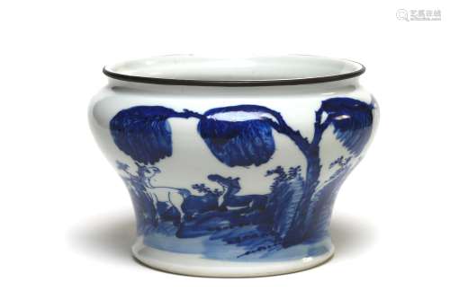A blue and white porcelain spittoon painted with horses unde...