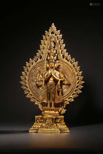 A GILT-BRONZE FIGURE OF EKADASHAMUKHA AVALOKITESHVARA,QING D...