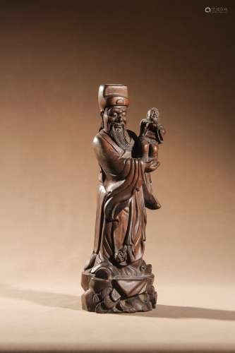 A CARVED HUANGYANGMU FIGURE OF FUXING,QING DYNASTY