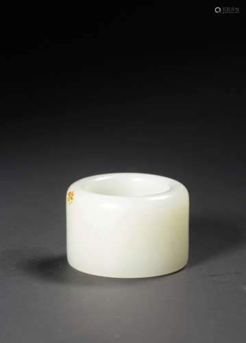 A WHITE AND RUSSET JADE ARCHER'S RING,QING DYNASTY