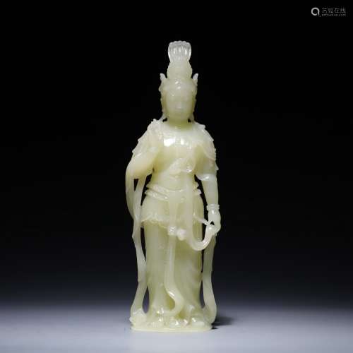 A YELLOW JADE FIGURE OF GUANYIN,QING DYNASTY