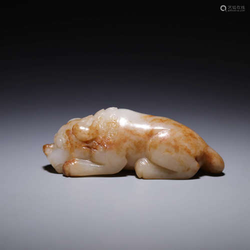 A CARVED WHITE AND RUSSET JADE BEAST,QING DYNASTY