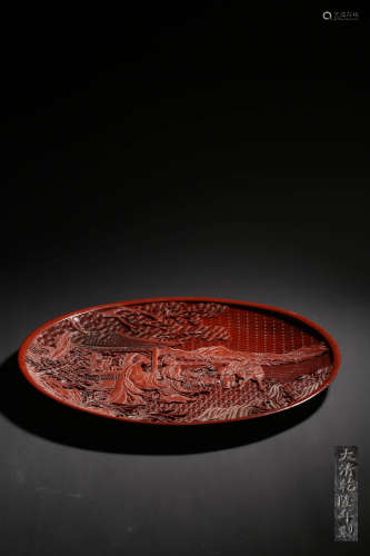 A CARVED CINNABAR LACQUER ‘LANDSCAPE’DISH,MARK AND PERIOD OF...