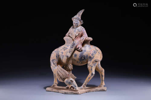 A QING STONE ‘MAN AND CAMEL’QING DYNASTY
