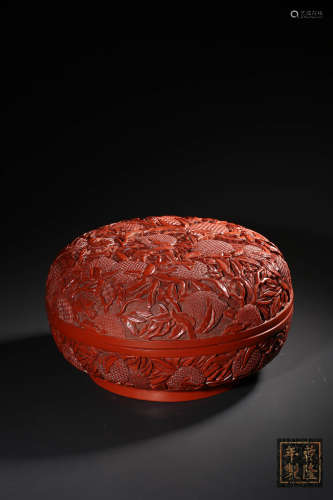 A CARVED CINNABAR LACQUER BOX AND COVER,MARK AND PERIOD OF Q...