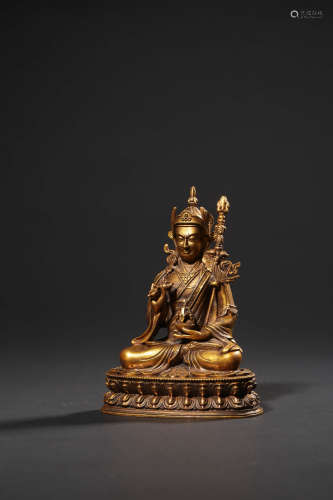 A  GILT-BRONZE FIGURE OF PADMASAMBHACA,QING DYNASTY