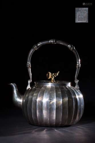 A TIN TEAPOT WITH HANDLE,QING DYNASTY