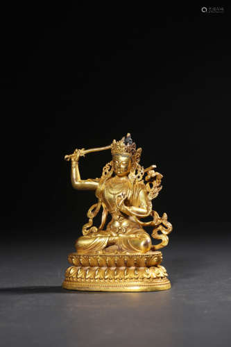 A GILT-BRONZE FIGURE OF MANJUSHRI,QING DYNASTY