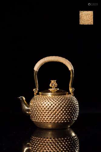 A TIN TEAPOT WITH HANDLE,QING DYNASTY