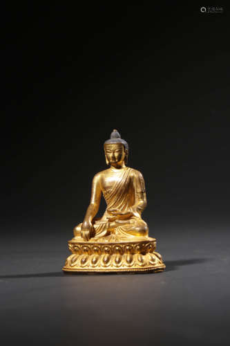 A GILT-BRONZE FIGURE OF BUDDHA SHAKYAMUNI,QING DYNASTY