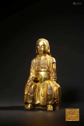 A GILT-BRONZE FIGURE OF XUAN WU DA DI,YONGLE MARK QING DYNAS...