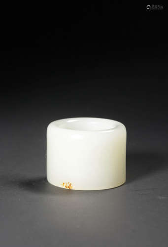 A WHITE AND RUSSET JADE ARCHER'S RING,,QING DYNASTY