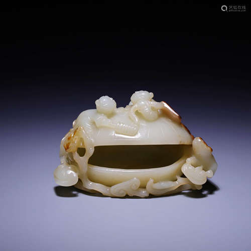 A  WHITE JADE ‘KID’CARVING,QING DYNASTY