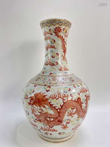 A famille rose dragon and phonix depicted vase, was marked, ...