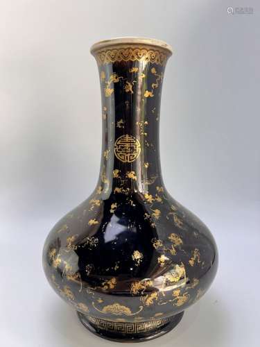 A heavly gilt black ground brooded vase, marked, Qing Dynast...