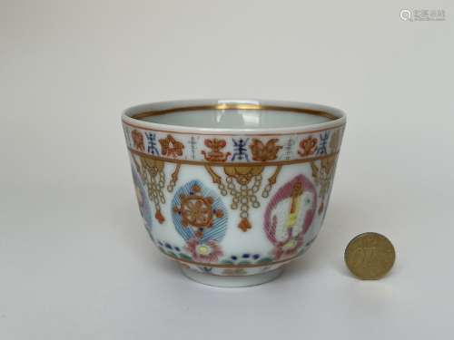 A cup decorated with india calligraphy, probably QianLong Pr...
