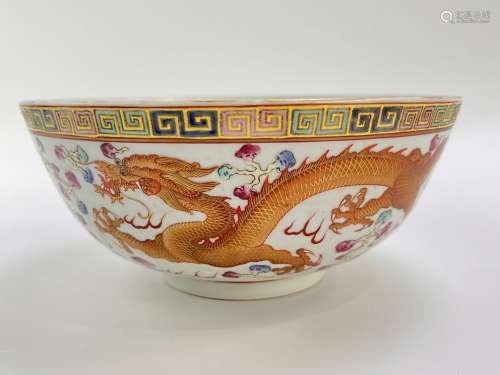 A large famille rose bowl decorated dragon and phonix, marke...