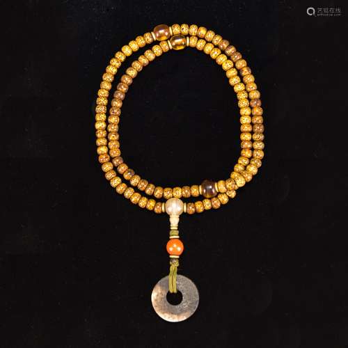 STRING OF 108 XINGYUE PUTI BEADS WITH ARCHAIC JADE PENDANT, ...