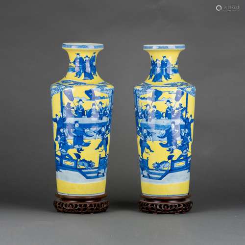 A PAIR OF BLUE AND WHITE YELLOW-GROUND ROULEAU VASES