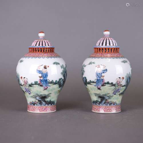 A PAIR OF FAMILLE ROSE 'BOYS' JARS AND COVERS, JIA...