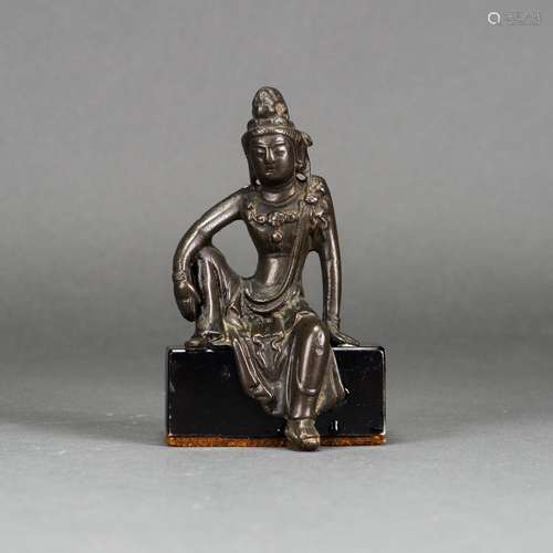 A CHINESE BRONZE FIGURE OF GUANYIN