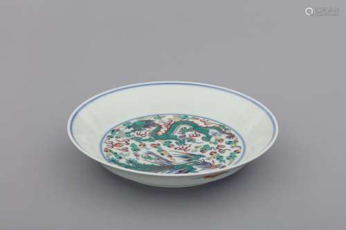 Qing famille rose dragon and phoenix floral porcelain charge...