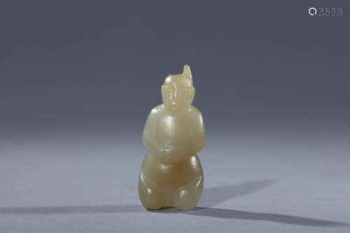 Chinese Han jade attendant figure standing on knees