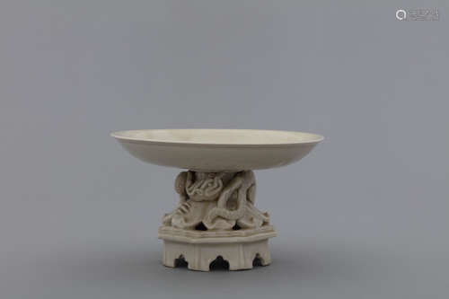 Song Ding white glazed charger hold by coiling dragon