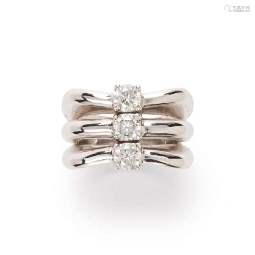 A diamond and fourteen karat white gold ring