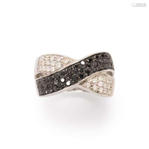 A black diamond, diamond and fourteen karat white gold ring