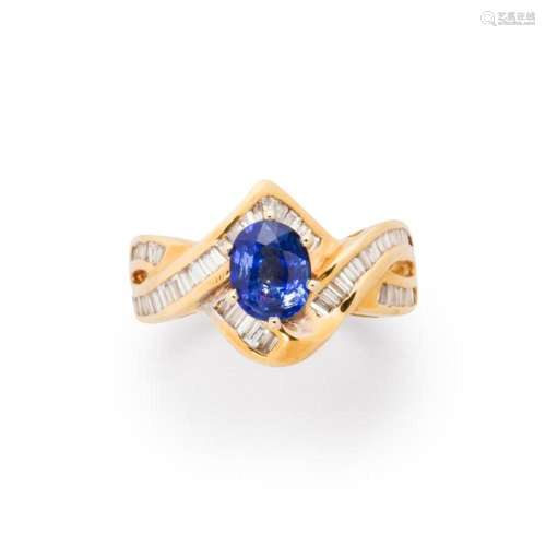 A sapphire, diamond and eighteen karat gold ring