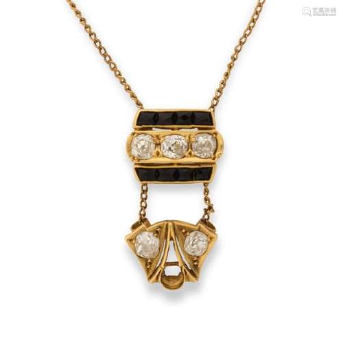 A diamond, sapphire and fourteen karat gold pendant necklace