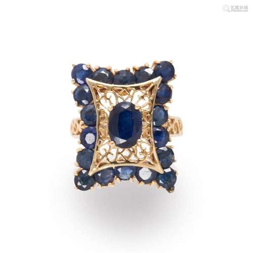 A sapphire and fourteen karat gold ring