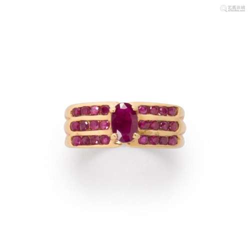 A ruby and ten karat gold ring