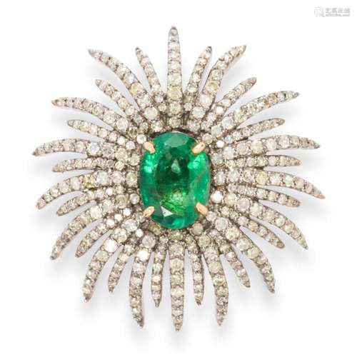 An emerald and diamond ring