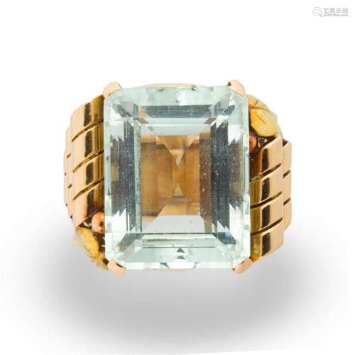 A Retro aquamarine and eighteen karat rose gold ring