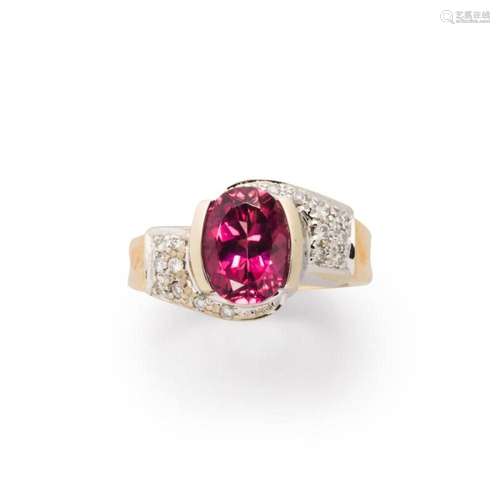 A pink tourmaline, diamond and fourteen karat gold ring